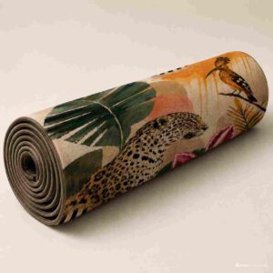 Tropical leopard and botanical printed area rug in a modern living room
